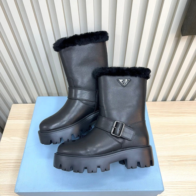 PRADA 25S MARTIN BOOTS IN BLACK CALFSKIN FUR-LINED