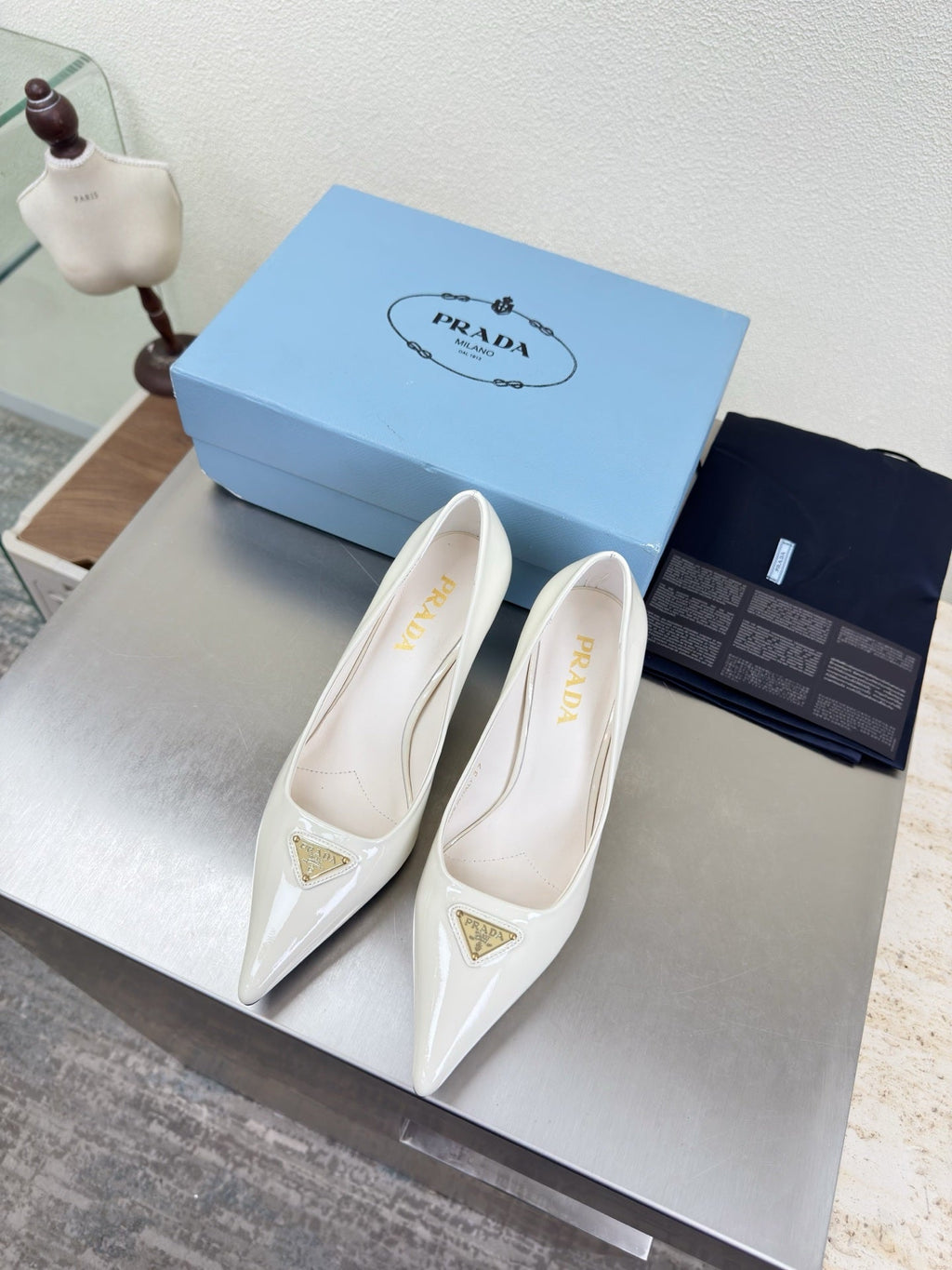 PRADA 26S POINTED TOE PUMPS 75MM IN WHITE PATENT CALFSKIN