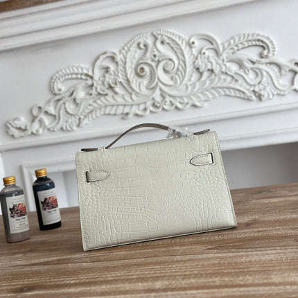 HM 26S KELLY MINI 22MM IN MILKY WHITE CROC EMBOSSED CALFSKIN SILVER KELLY BUCKLE