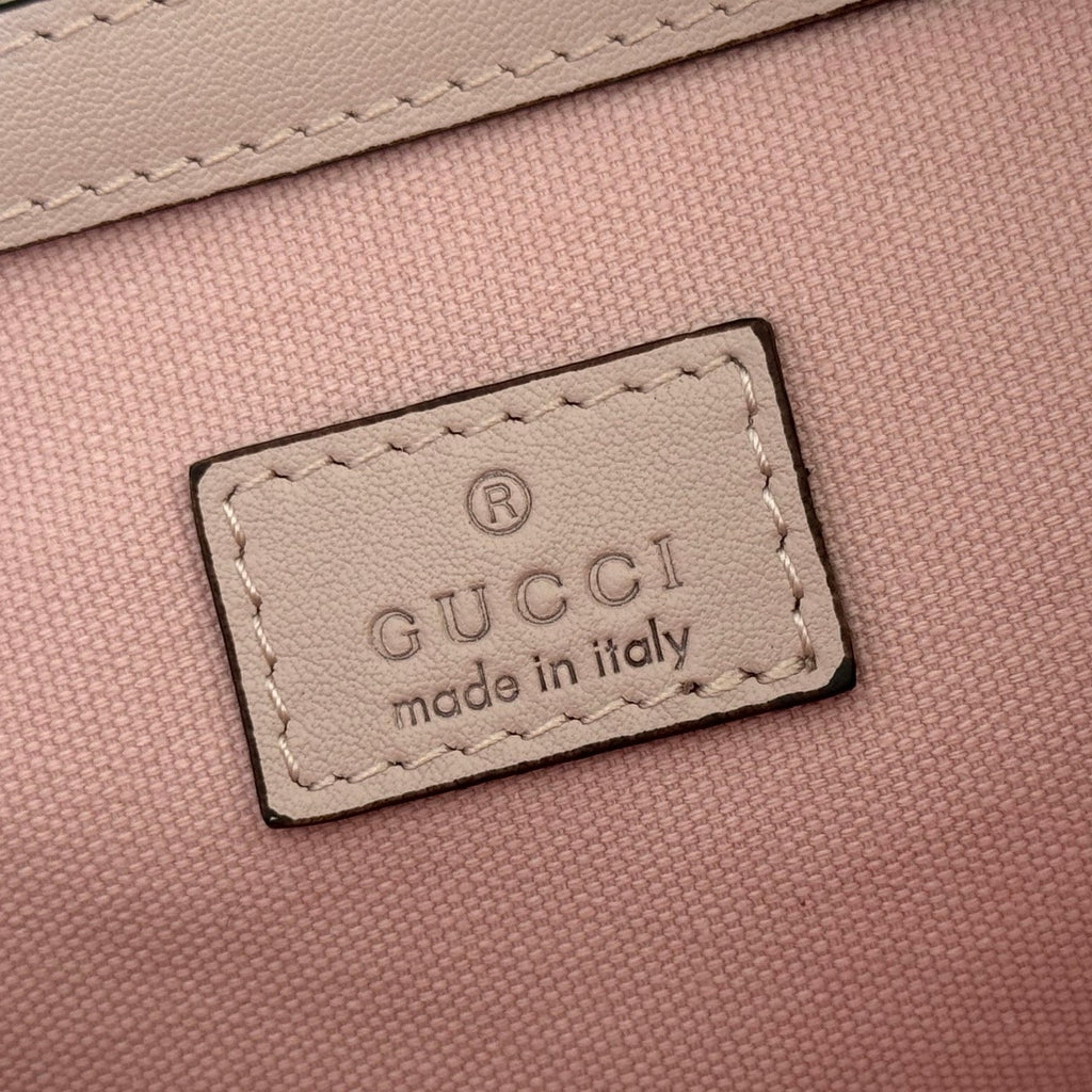 GUCCI 26S GG EMBLEM BUCKET BAG 25 IN LIGHT PINK COATED FABRIC