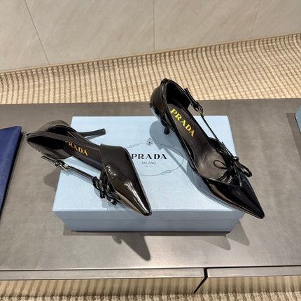 PRADA 26S POINTED TOE CUT OUT HIGH HEELS 75MM IN BLACK CALFSKIN WITH BOW