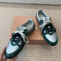 GYMNASIUM SNEAKER IN SILVER FABRIC AND DARK GREEN SNAKE EFFECT CALFSKIN
