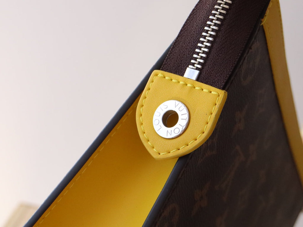 LV 25S POCHETTE VOYAGE 26 IN YELLOW MONOGRAM MACASSAR COATED CANVAS