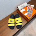 HM 26S KELLY BUCKLE DOUBLE STRAP SANDALS IN YELLOW CALFSKIN