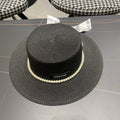 MIUMIU SMALL-BRIM STRAW HAT IN BLACK AND PEARL EMBELLISHED