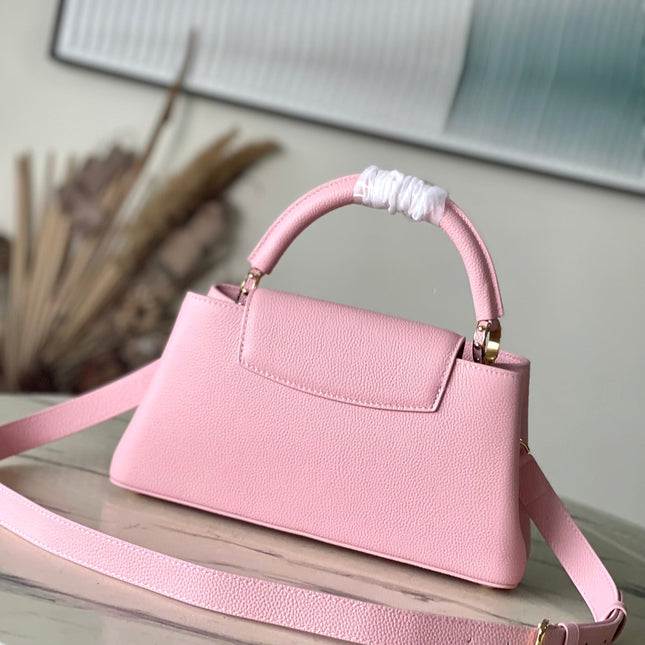 CAPUCINES EAST-WEST 33 IN BLUSH PINK CALFSKIN GOLD HARDWARE