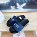 SLIDES SANDAL IN BLACK TPU WITH NAVY BLUE STRAP WHITE EMBOSSED LOGO