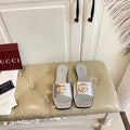 GUCCI 26S SLIDES IN SILVER CALFSKIN