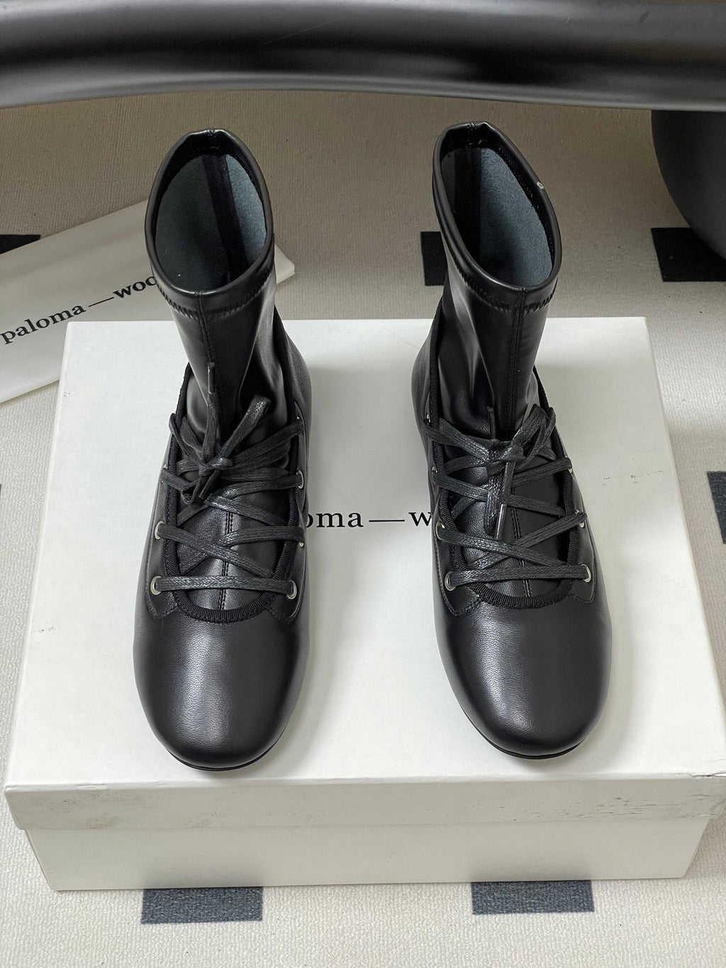 ALO 25S PALOMA WOOL FLAT ANKLE BOOTS IN BLACK LAMBSKIN