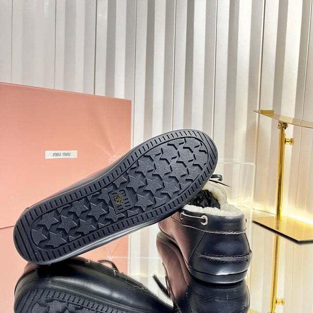 MIUMIU 26S FUR BOAT SHOES IN BLACK CALFSKIN