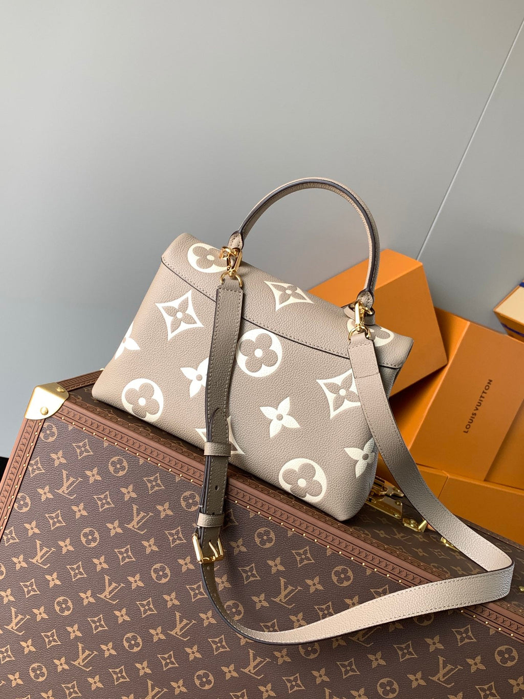 MADELEINE 30 IN BEIGE MONOGRAM CALFSKIN EMBOSSED LOGO