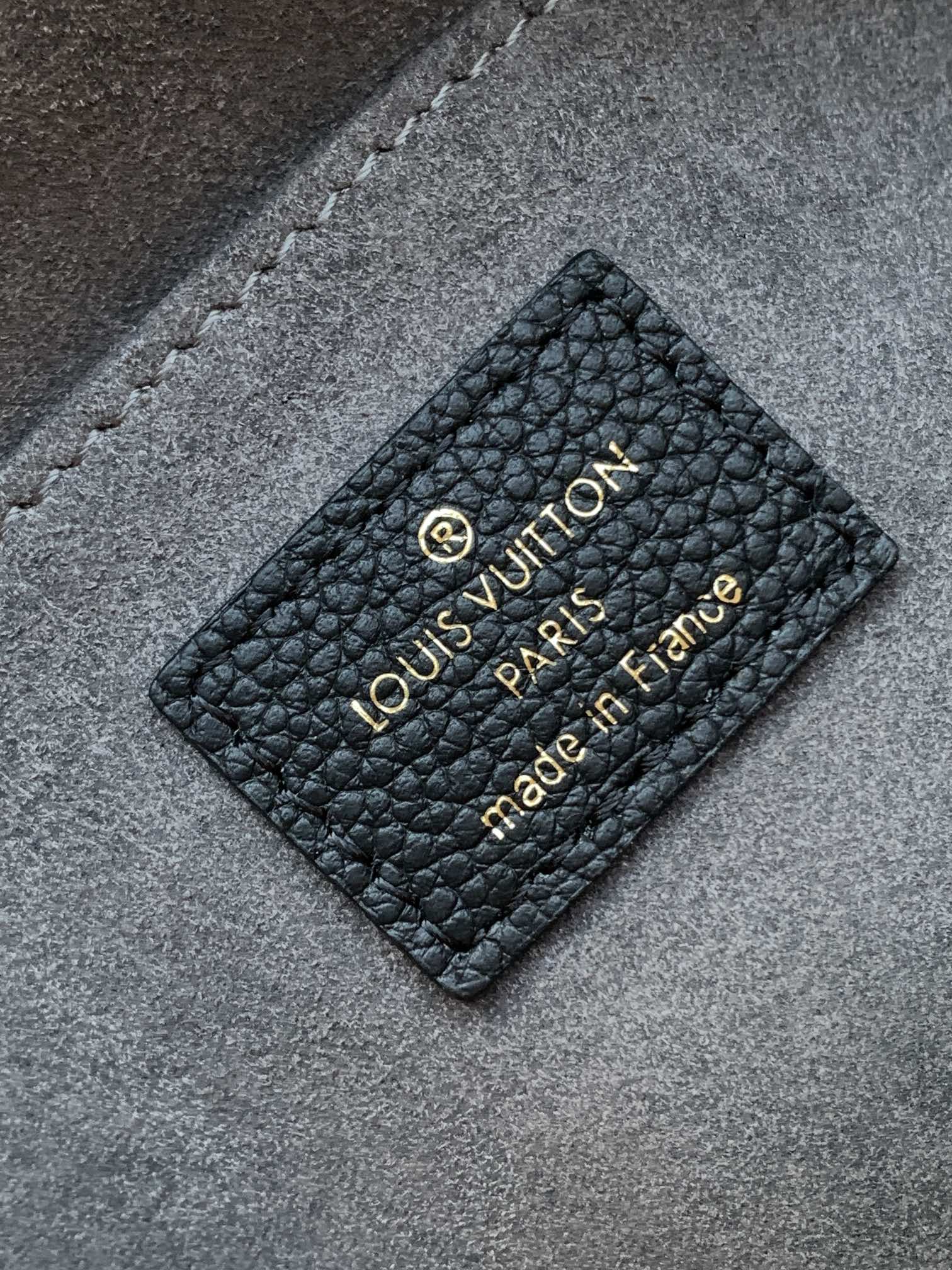 MADELEINE 30 IN BLACK MONOGRAM CALFSKIN EMBOSSED LOGO