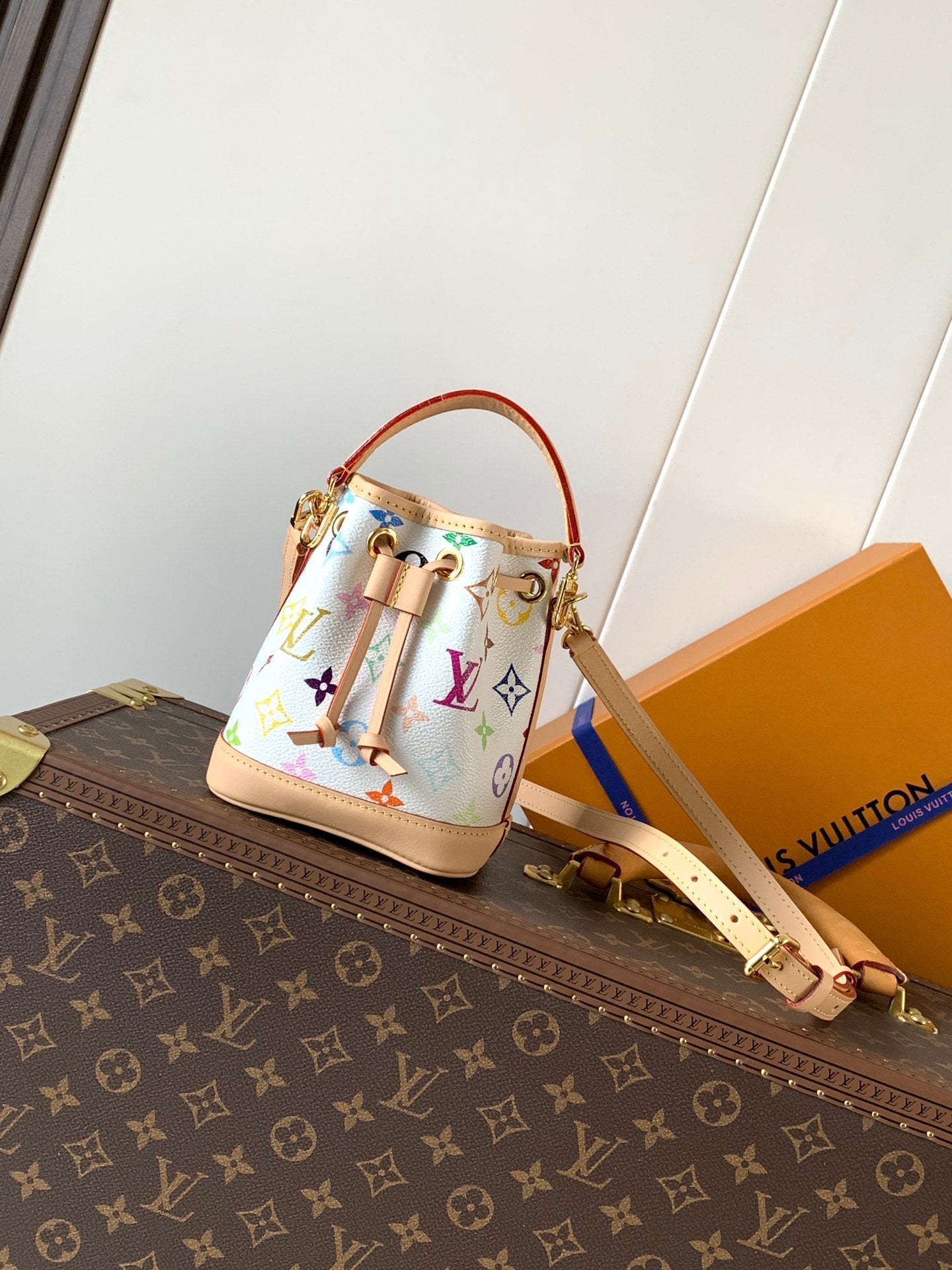 LV 26S NANO NOÉ 16 IN WHITE COATED CANVAS