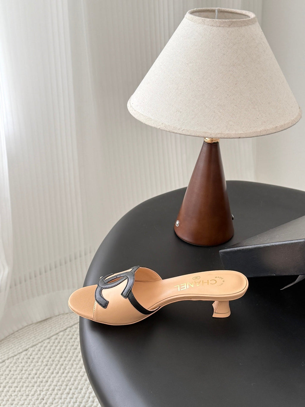 CHANEL MULES IN BEIGE AND BLACK CALFSKIN