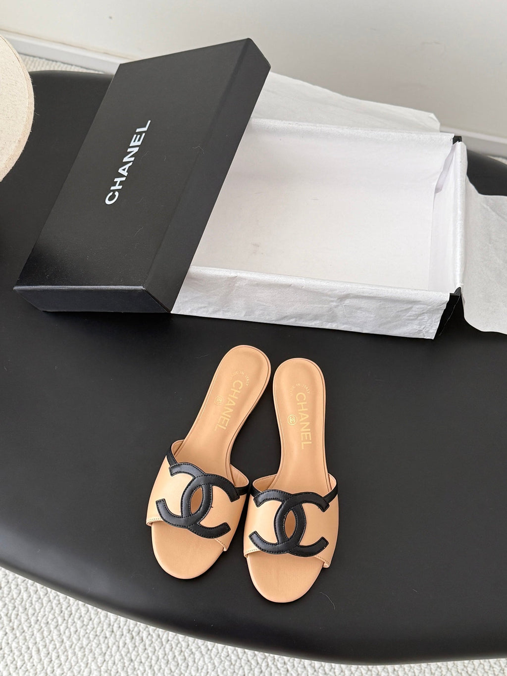 CHANEL MULES IN BEIGE MIX BLACK CALFSKIN