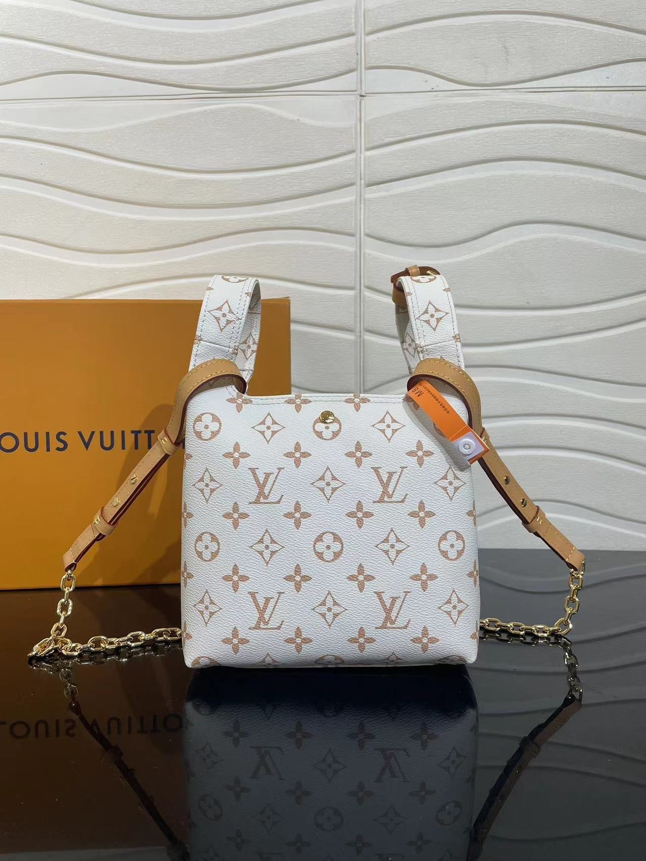 LV ATLANTIS BB 17 IN WHITE MONOGRAM COATED CANVAS