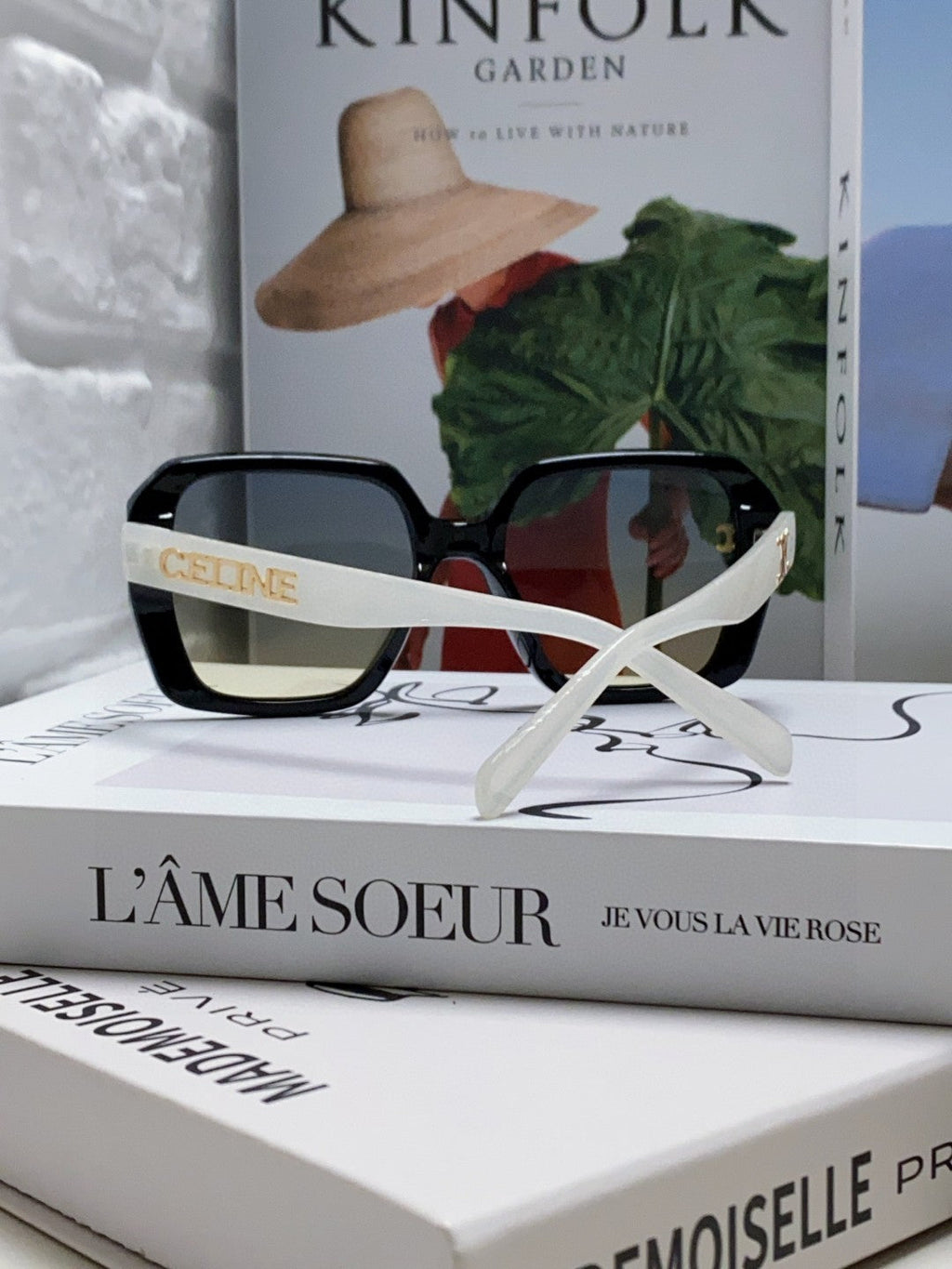 TRIOMPHE SUNGLASSES 548593 IN BLACK AND WHITE ACETATE