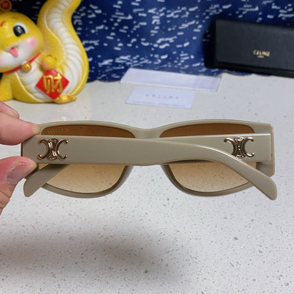 TRIOMPHE SUNGLASS 533218 IN IVORY ACETATE CAMEL LENSES