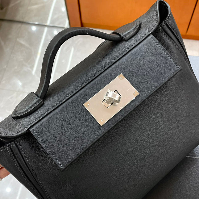 MINI 24/24 21CM IN BLACK EVERCOLOR CALFSKIN SILVER KELLY BUCKLE