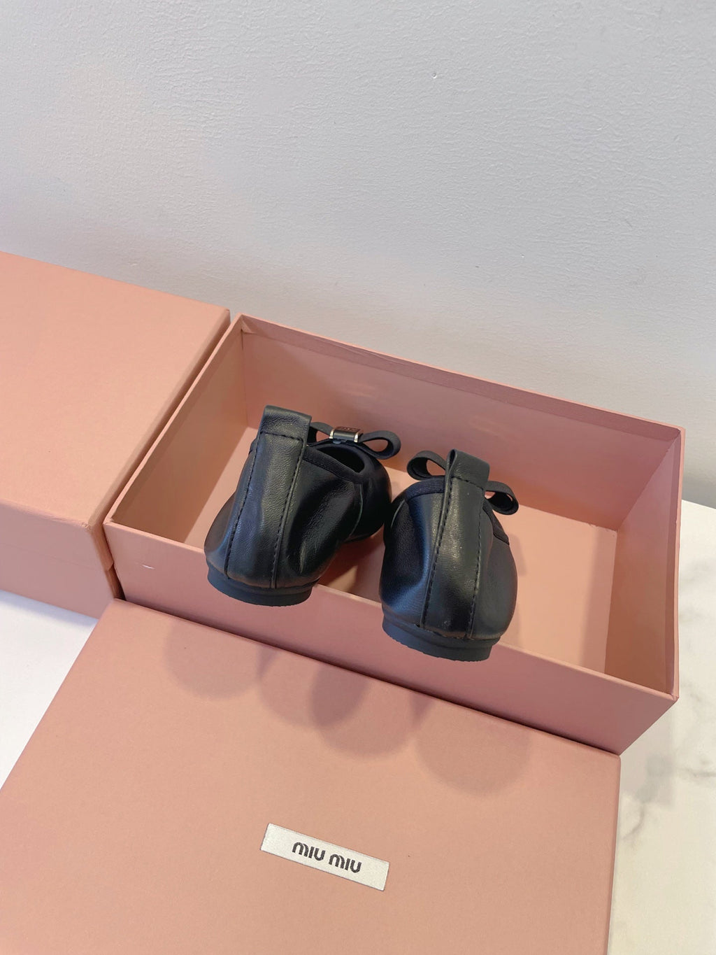 MIUMIU 26S BALLET FLATS IN BLACK CALFSKIN WITH BOW