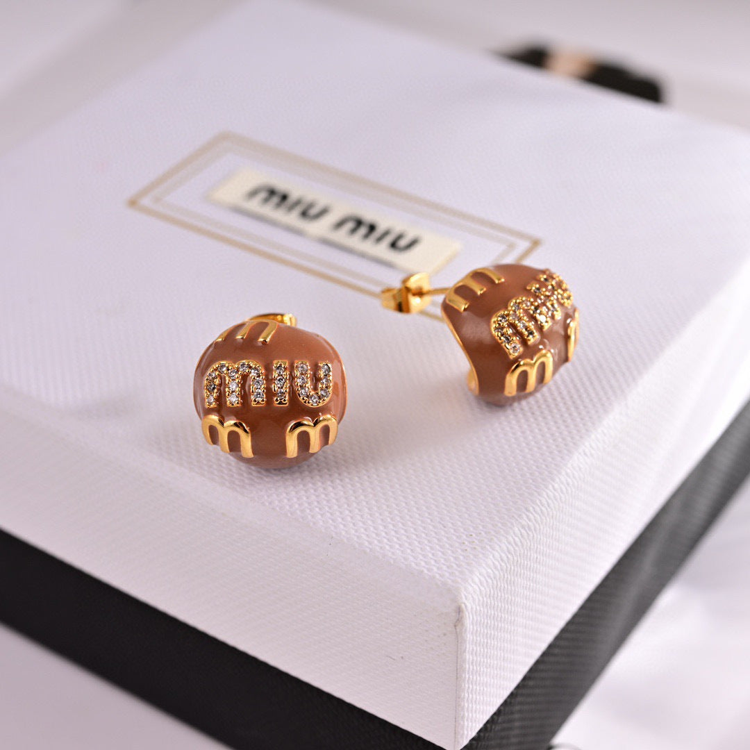 MIUMIU 26S MIU CRYSTAL LOGO STUD EARRINGS IN BROWN ENAMEL AND GOLD TONE METAL 633129