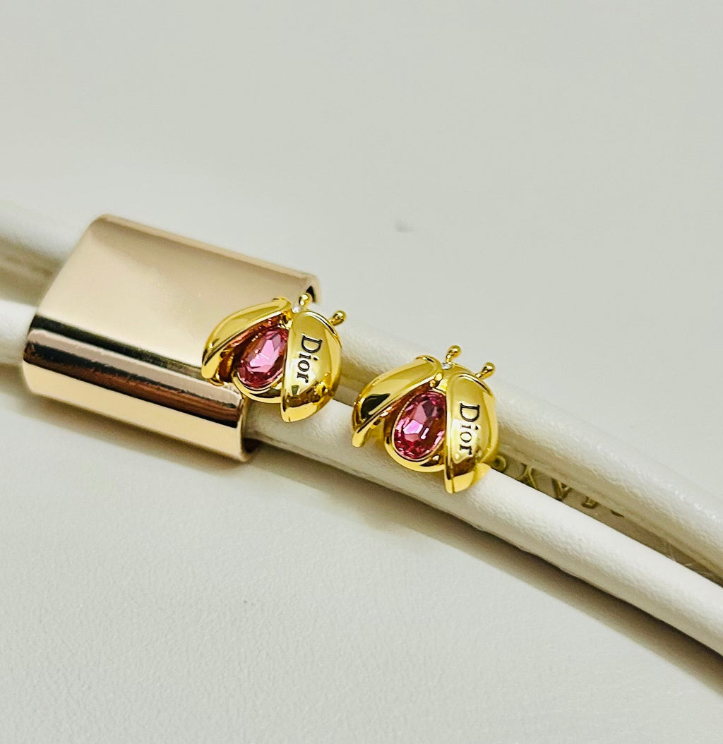 CD 26S LADYBUG PINK CRYSTAL STUD EARRINGS IN GOLD TONE METAL 644370