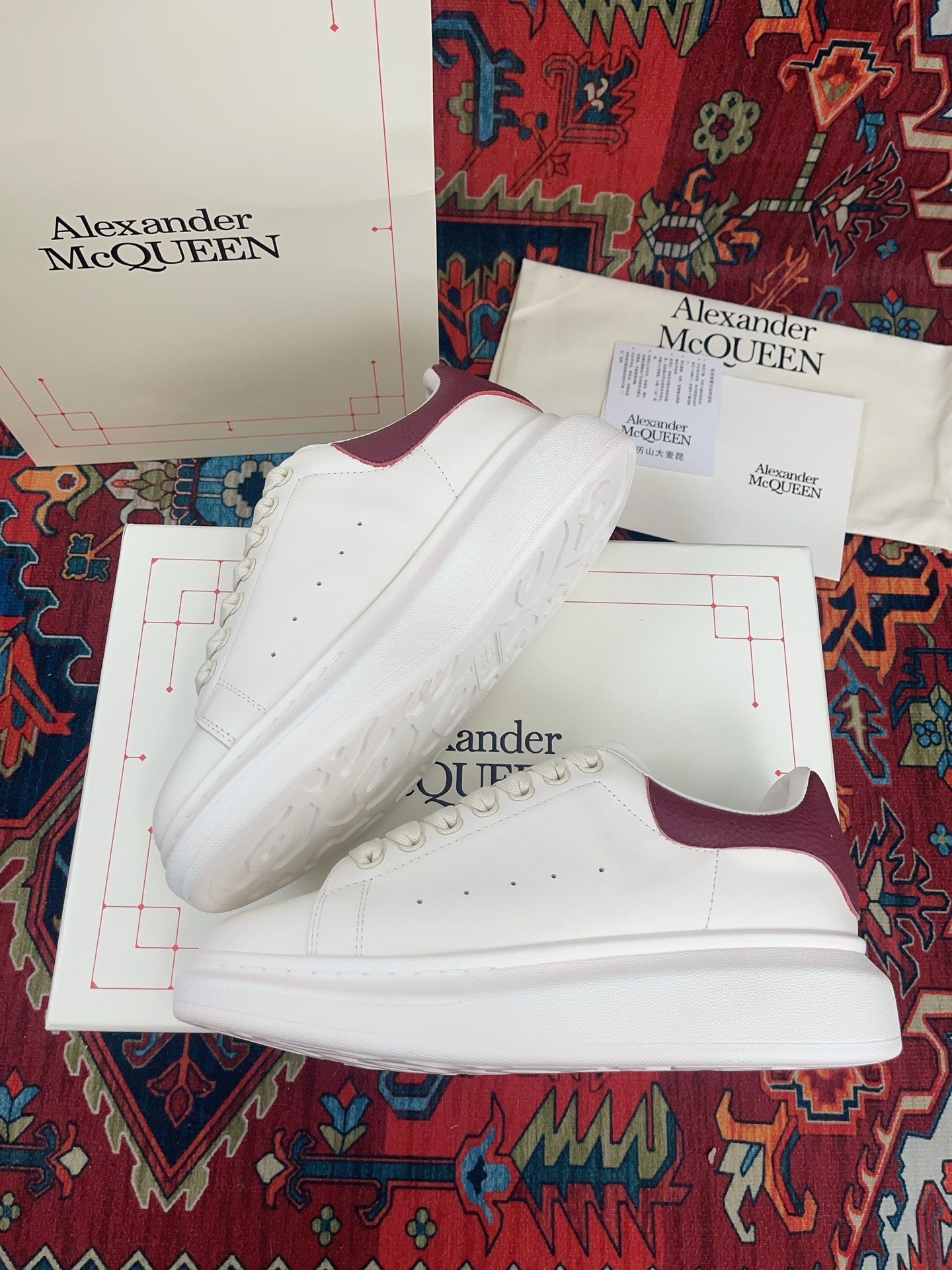 OVERSIZED SNEAKER IN WHITE CALFSKIN BURGUNDY EMBOSSED HEEL TAB