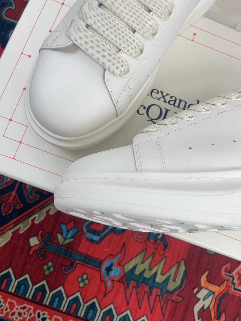 OVERSIZED SNEAKER IN WHITE CALFSKIN ORANGE HEEL TAB EMBOSSED LOGO