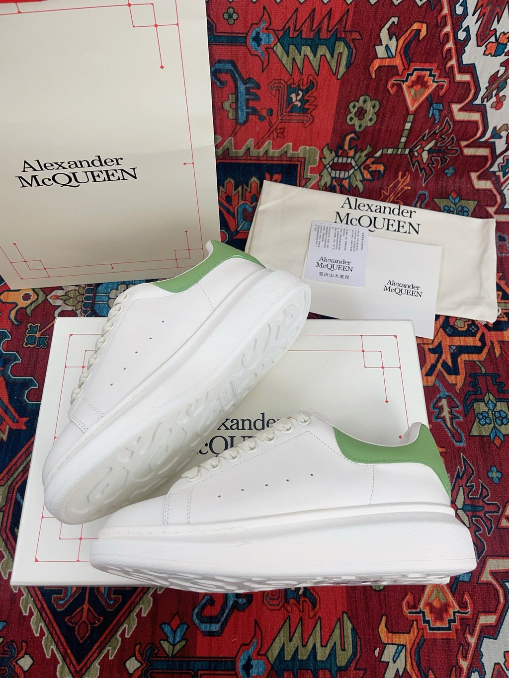 OVERSIZED SNEAKER IN WHITE CALFSKIN WITH EMBOSSED HUNTER GREEN HEEL TAB