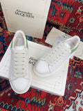 OVERSIZED SNEAKER IN WHITE CALFSKIN WITH EMBOSSED HUNTER GREEN HEEL TAB
