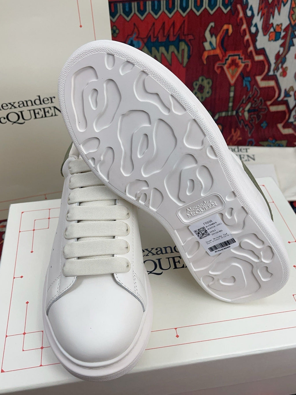OVERSIZED SNEAKER IN WHITE CALFSKIN WITH EMBOSSED OLIVE GREEN HEEL TAB