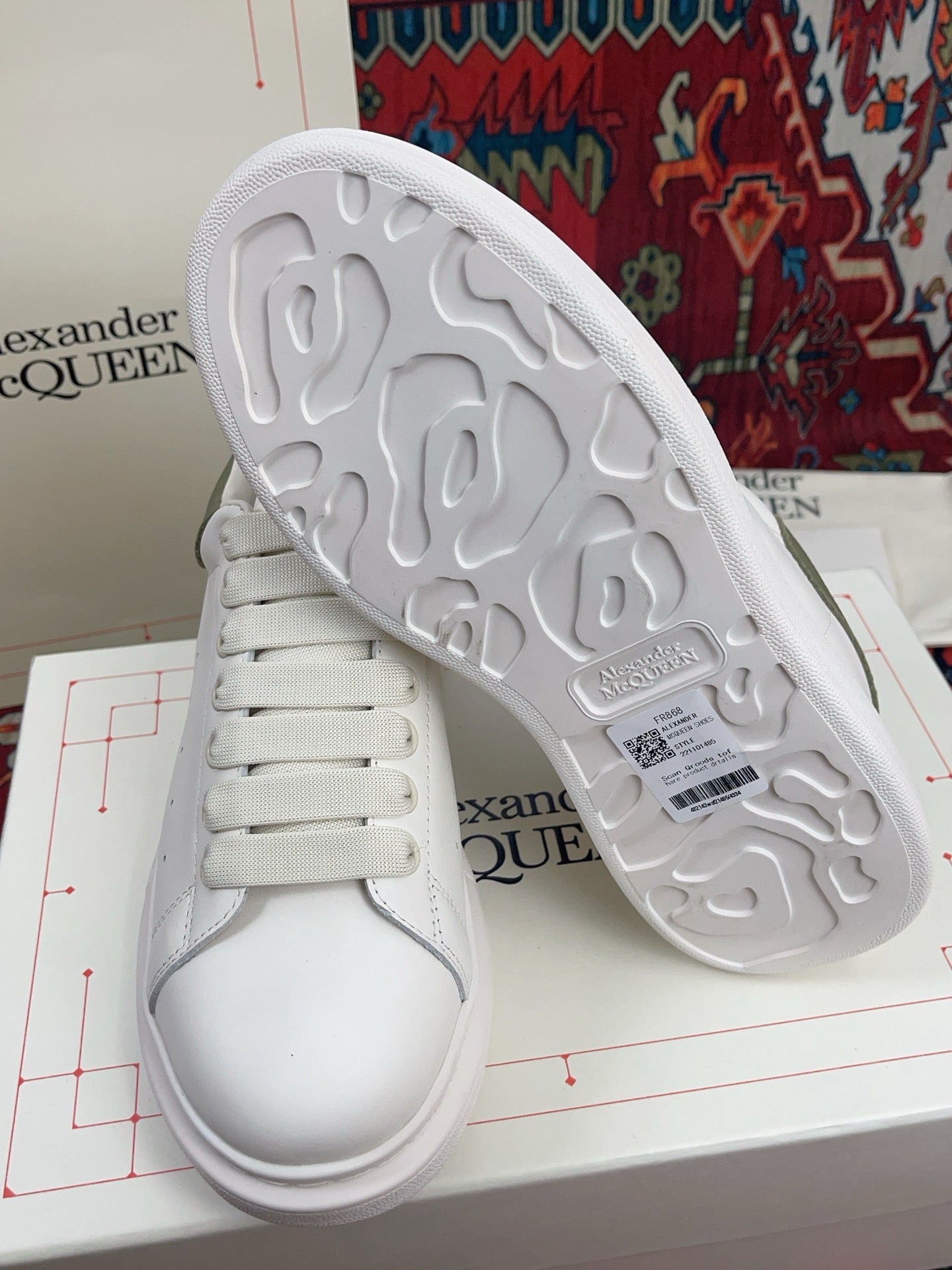 OVERSIZED SNEAKER IN WHITE CALFSKIN WITH EMBOSSED OLIVE GREEN HEEL TAB