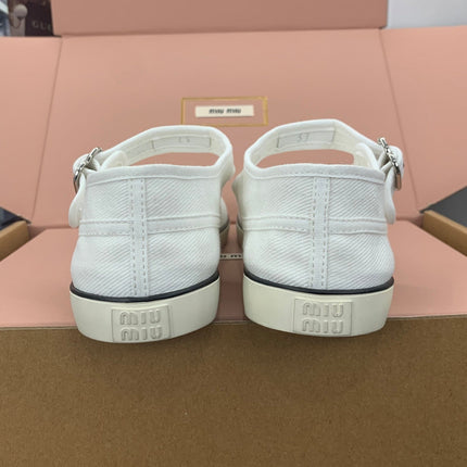 MIUMIU 26S MARY JANE FLATS IN WHITE CANVAS LOGO