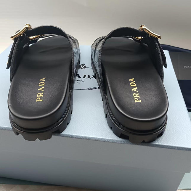 PRADA 26S STRAP SLIDES IN BLACK CROC EMBOSSED CALFSKIN GOLD HARDWARE