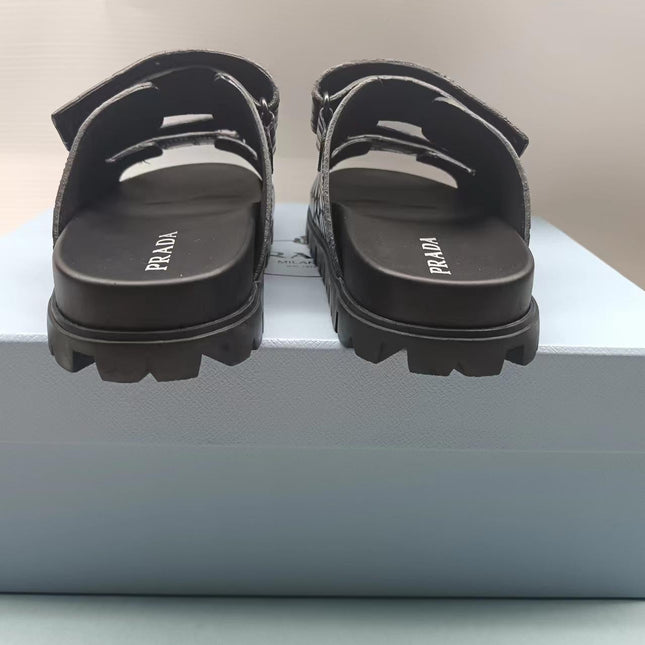 PRADA 26S STRAP SLIDES IN BLACK CROC EMBOSSED CALFSKIN