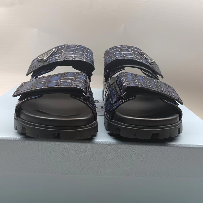 PRADA 26S STRAP SLIDES IN BLACK CROC EMBOSSED CALFSKIN