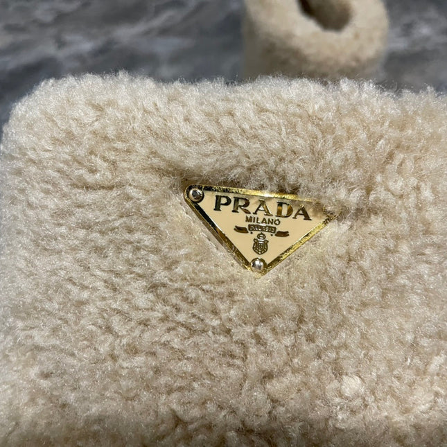 PRADA 26S ANKLE BOOTS IN BEIGE FUR