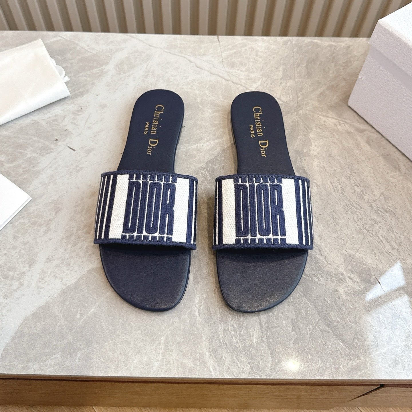 DIOR FLAT SLIDES 25S IN MIDNIGHT BLUE CALFSKIN AND FABRIC BRAND NAME EMBROIDERY