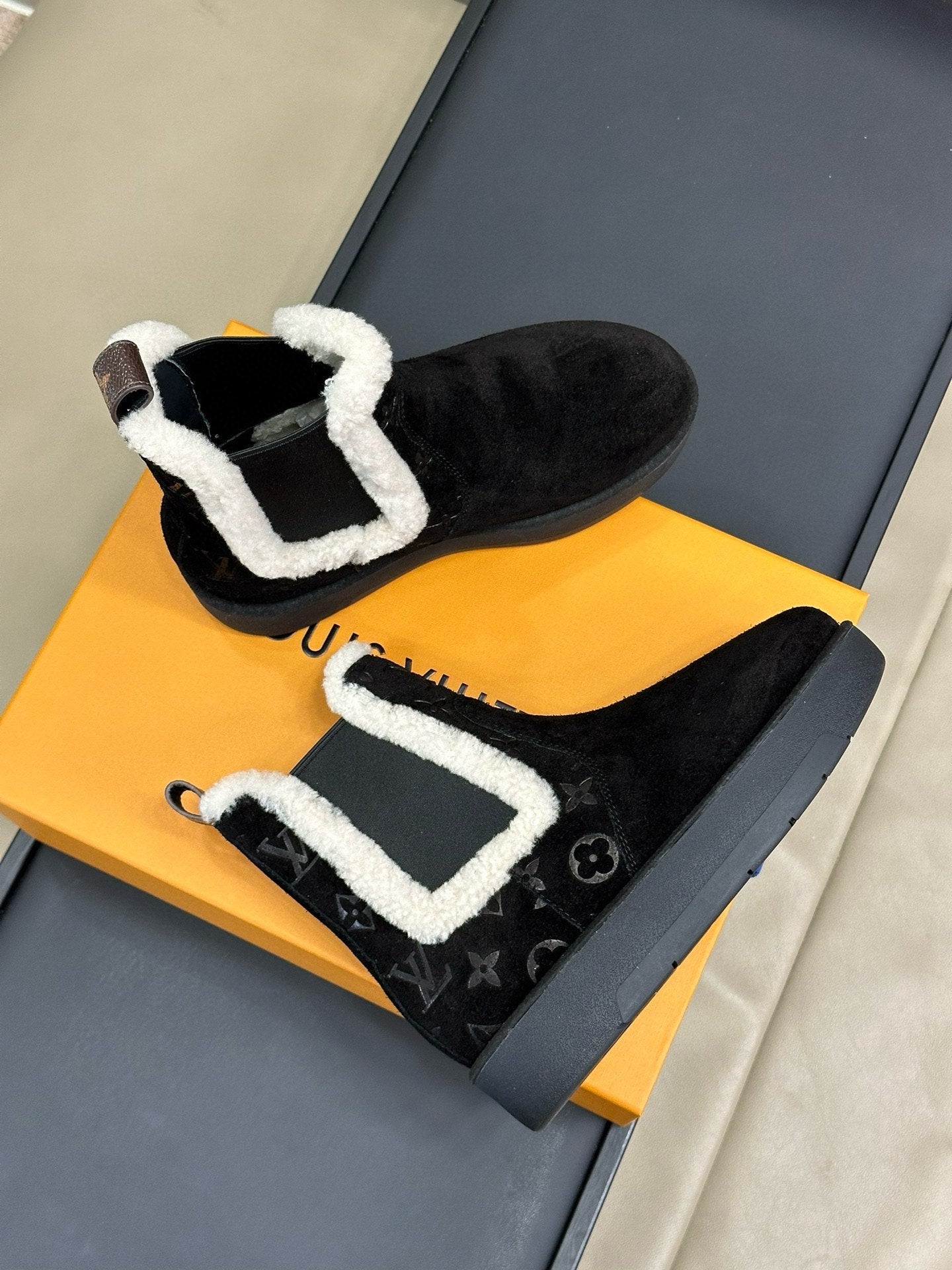 ASPEN CHELSEA ANKLE BOOTS IN BLACK MONOGRAM-DEBOSSED SUEDE