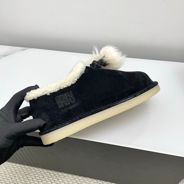 MIUMIU 26S ANKLE SHEARLING BOOTS IN BLACK SUEDE