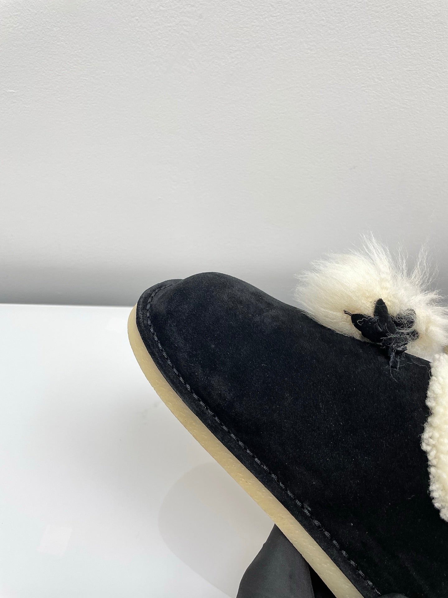 MIUMIU 26S ANKLE SHEARLING BOOTS IN BLACK SUEDE