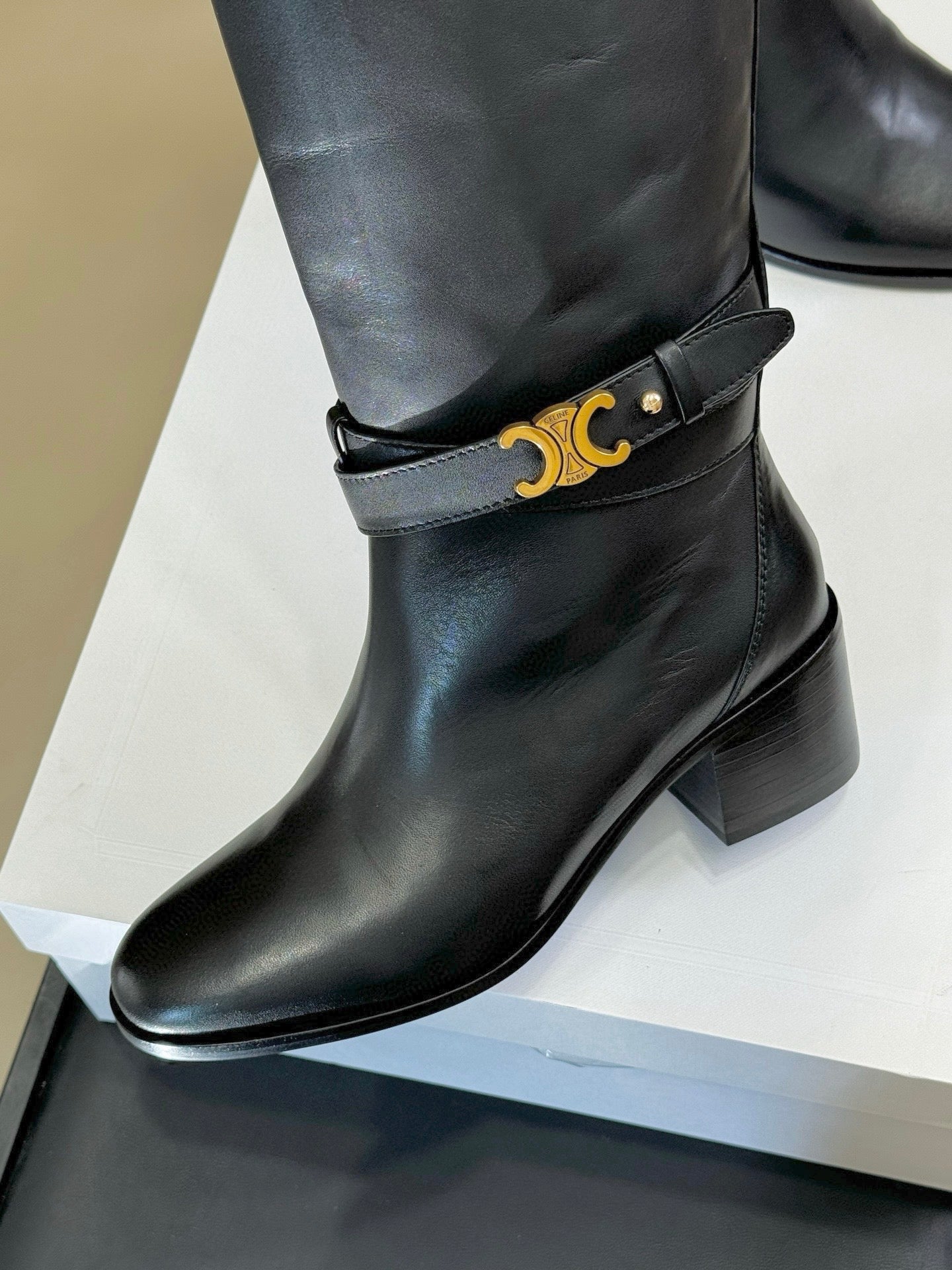 CELINE 26S HIGH-TOP HEELED BOOTS IN BLACK CALFSKIN