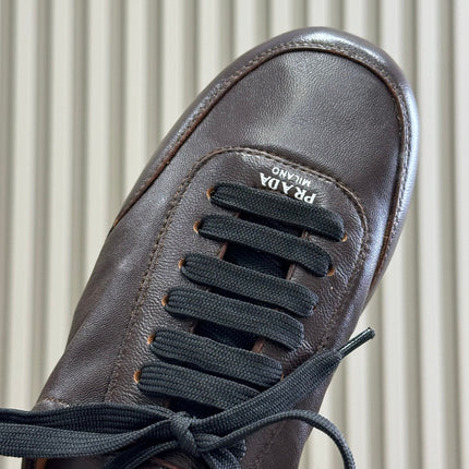 PRADA 25S COLLAPSE MULES IN DARK BROWN CALFSKIN