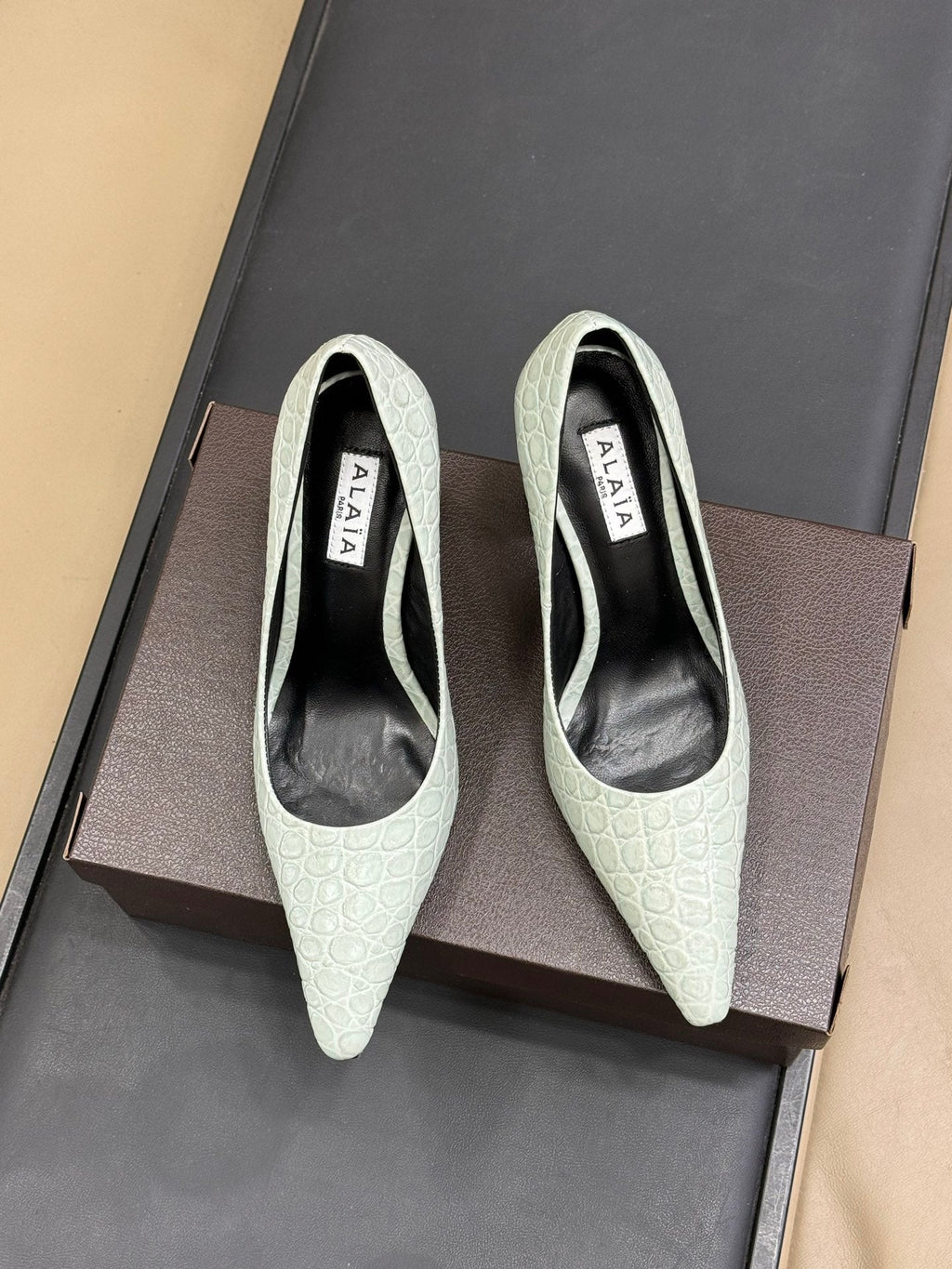 ALAIA 25S POINTY TOE PUMPS 90MM IN CELADON GREEN CALFSKIN