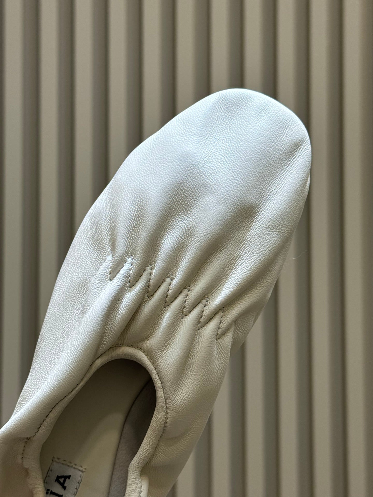 ALAIA 26S KNIT BALLET FLATS IN CREAM WHITE LAMBSKIN