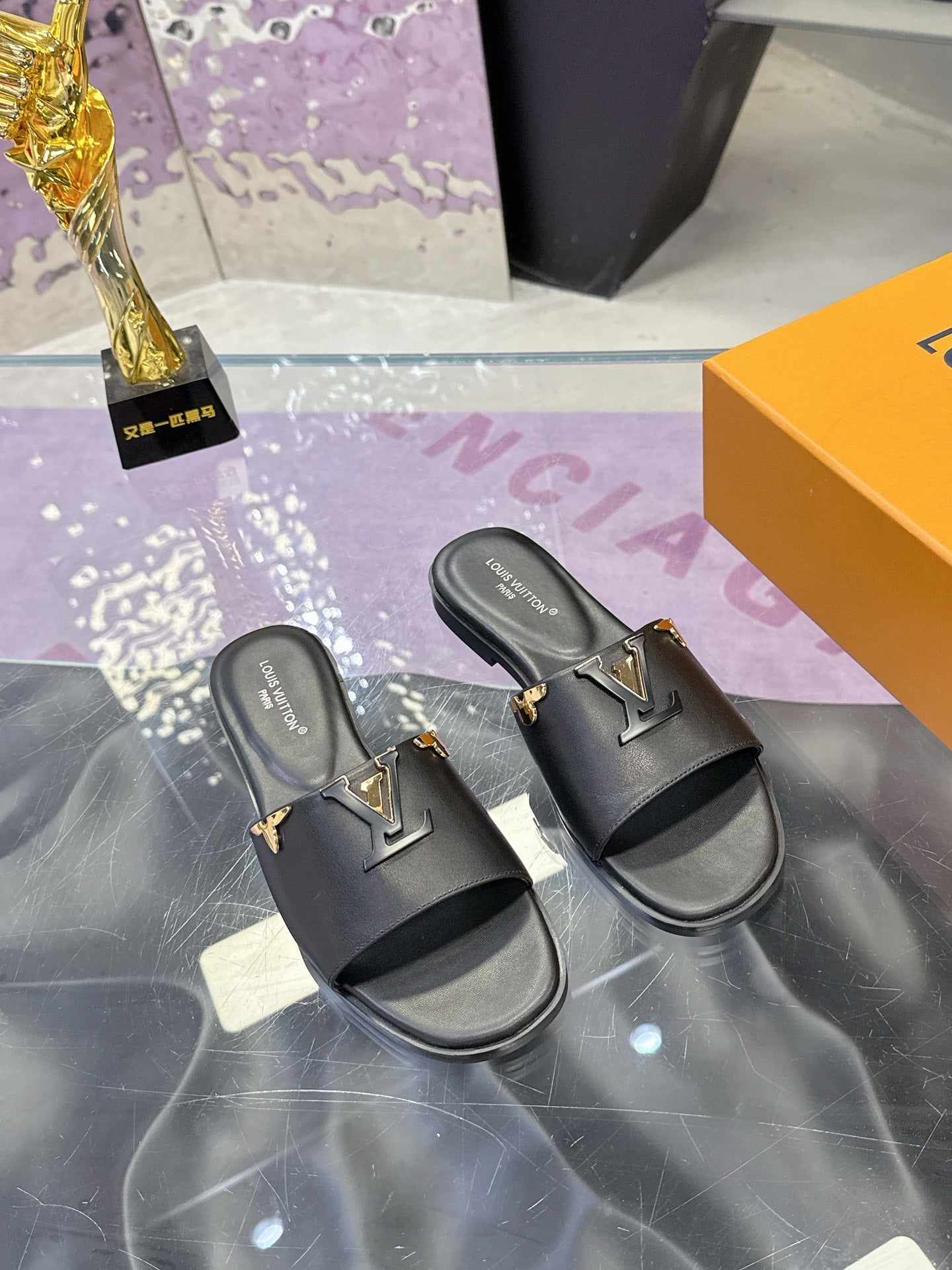 LV 26S FLAT SLIDE SANDALS IN BLACK CALFSKIN GOLD HARDWARE