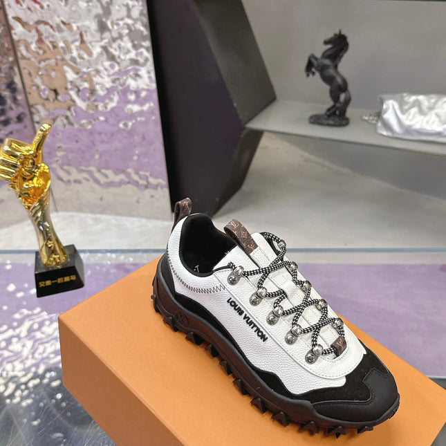 LV 26S RUSH XPLORER SNEAKER IN WHITE BLACK CALFSKIN AND SUEDE