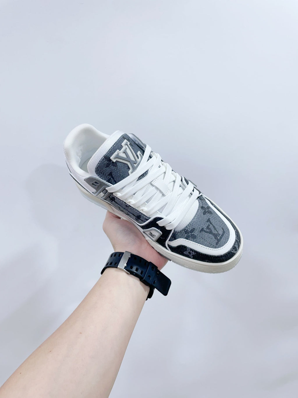 LV TRAINER SNEAKER IN DOVE GRAY MONOGRAM DENIM