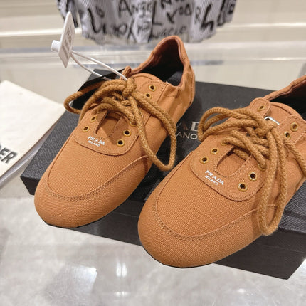 PRADA 26S COLLAPSE SNEAKERS IN CARAMEL BROWN CANVAS