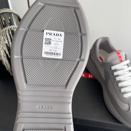PRADA 26S AMERICA CUP SNEAKERS IN COOL GRAY SOFT RUBBER AND BIKE FABRIC